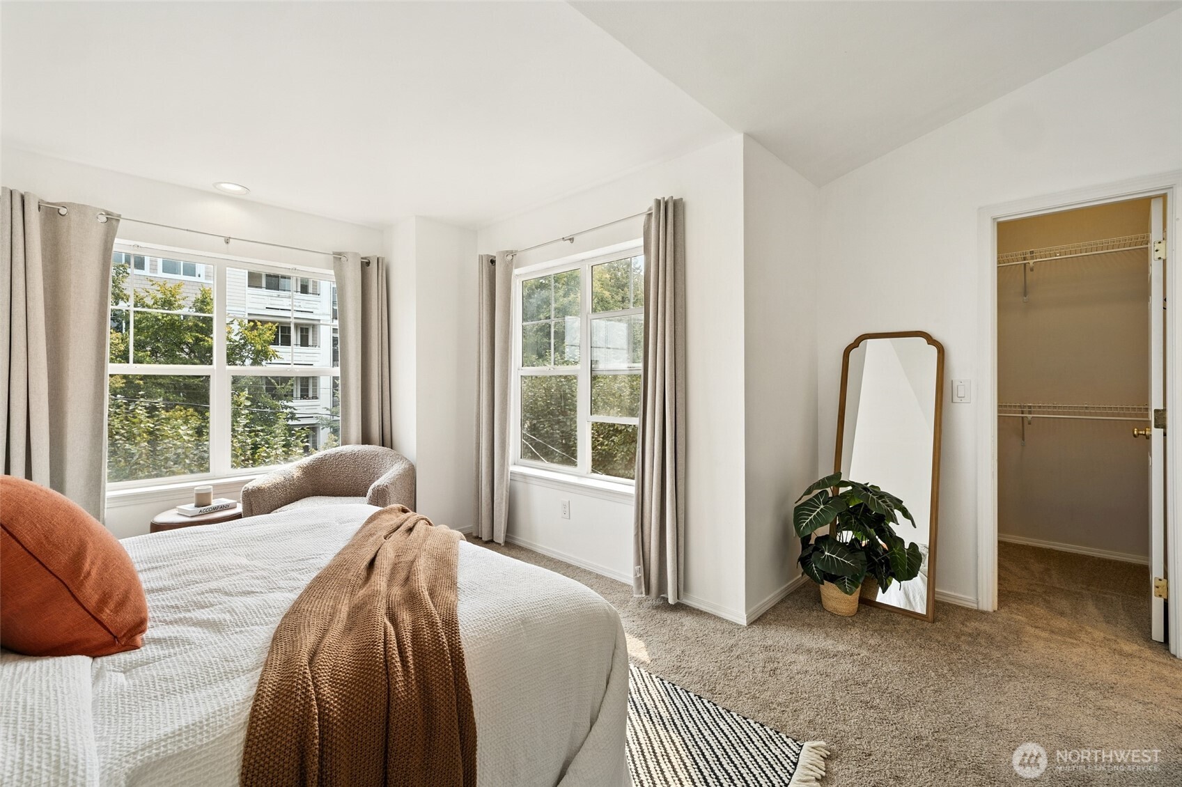 1512 Northwest 57th Street, Unit B Seattle, WA 98107 - Photo 16 of 27 a bedroom with a bed and a window