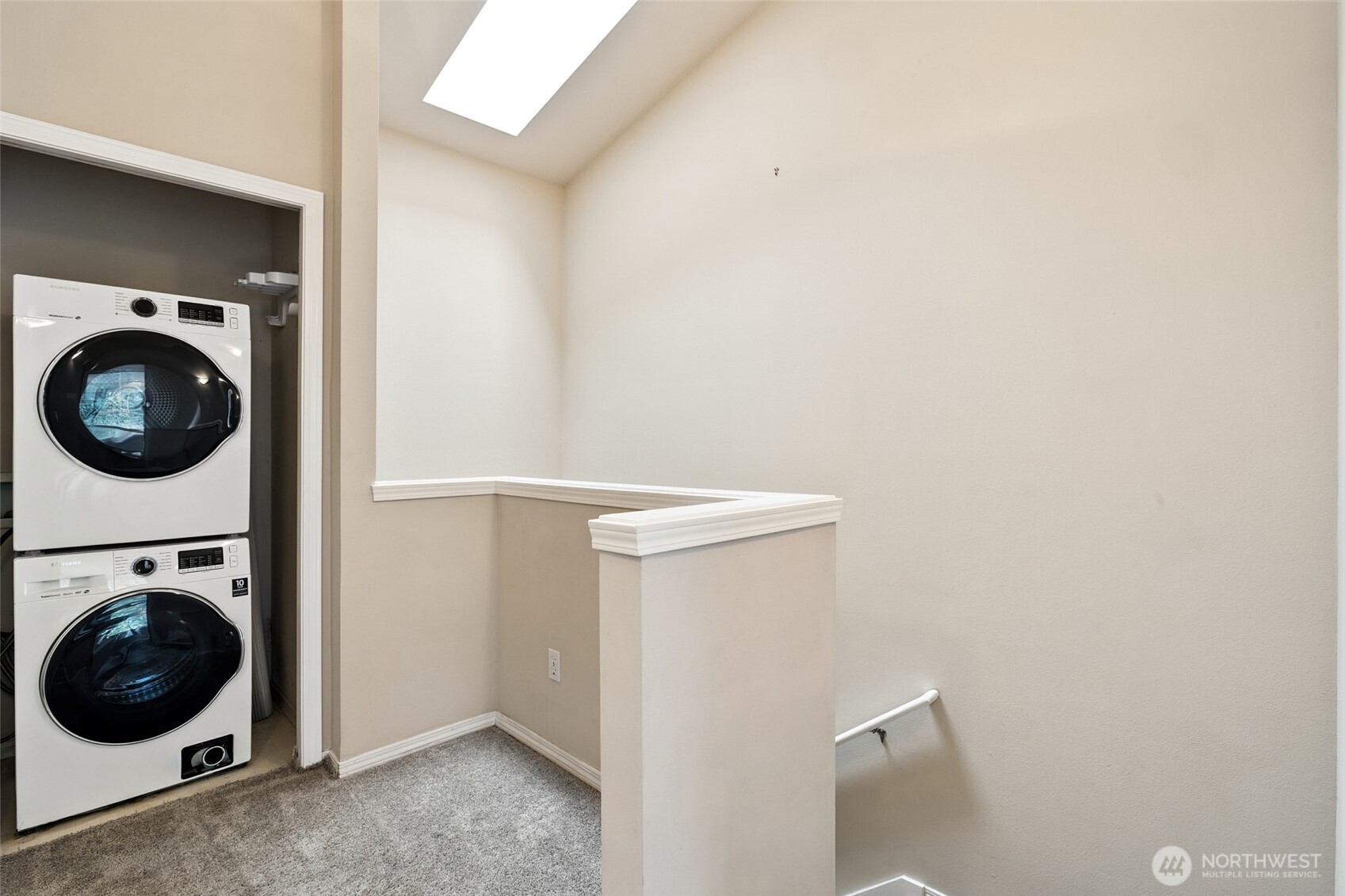 1512 Northwest 57th Street, Unit B Seattle, WA 98107 - Photo 24 of 27 a utility room with dryer and washer