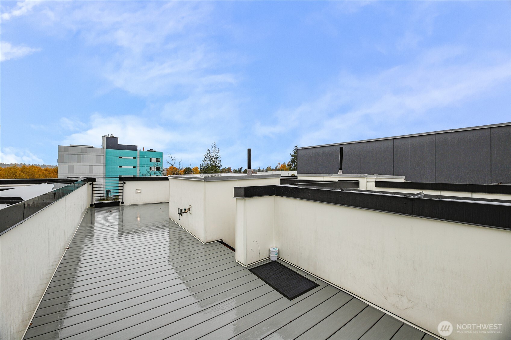 437 Northeast 73rd Street, Unit B Seattle, WA 98115 - Photo 17 of 21 a view of a terrace with chairs