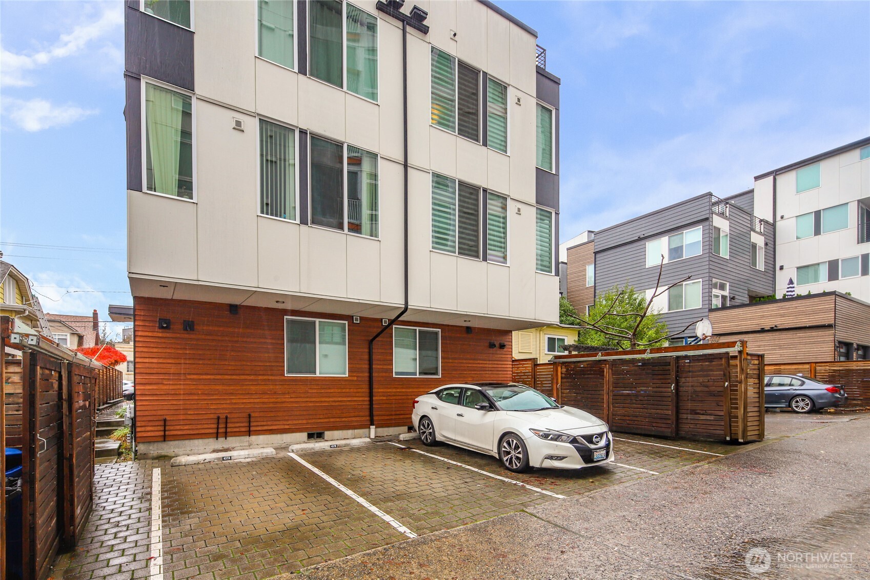 437 Northeast 73rd Street, Unit B Seattle, WA 98115 - Photo 19 of 21 a car parked in front of a building
