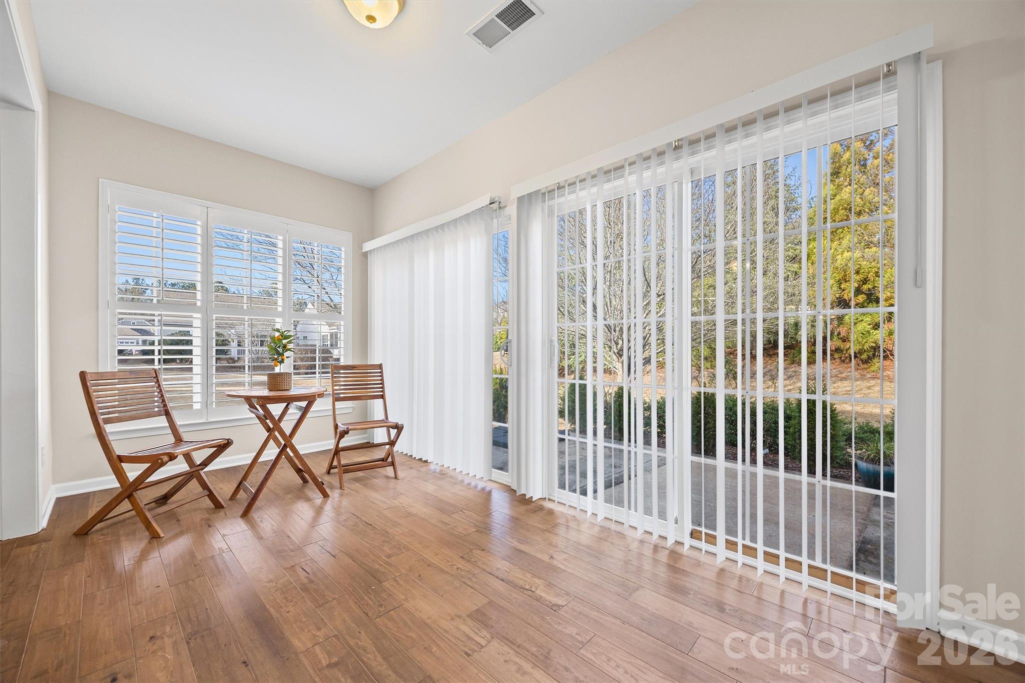 2227 Lilac Lane Fort Mill, SC 29707 - Photo 12 of 42 a view of a livingroom with furniture and wooden floor