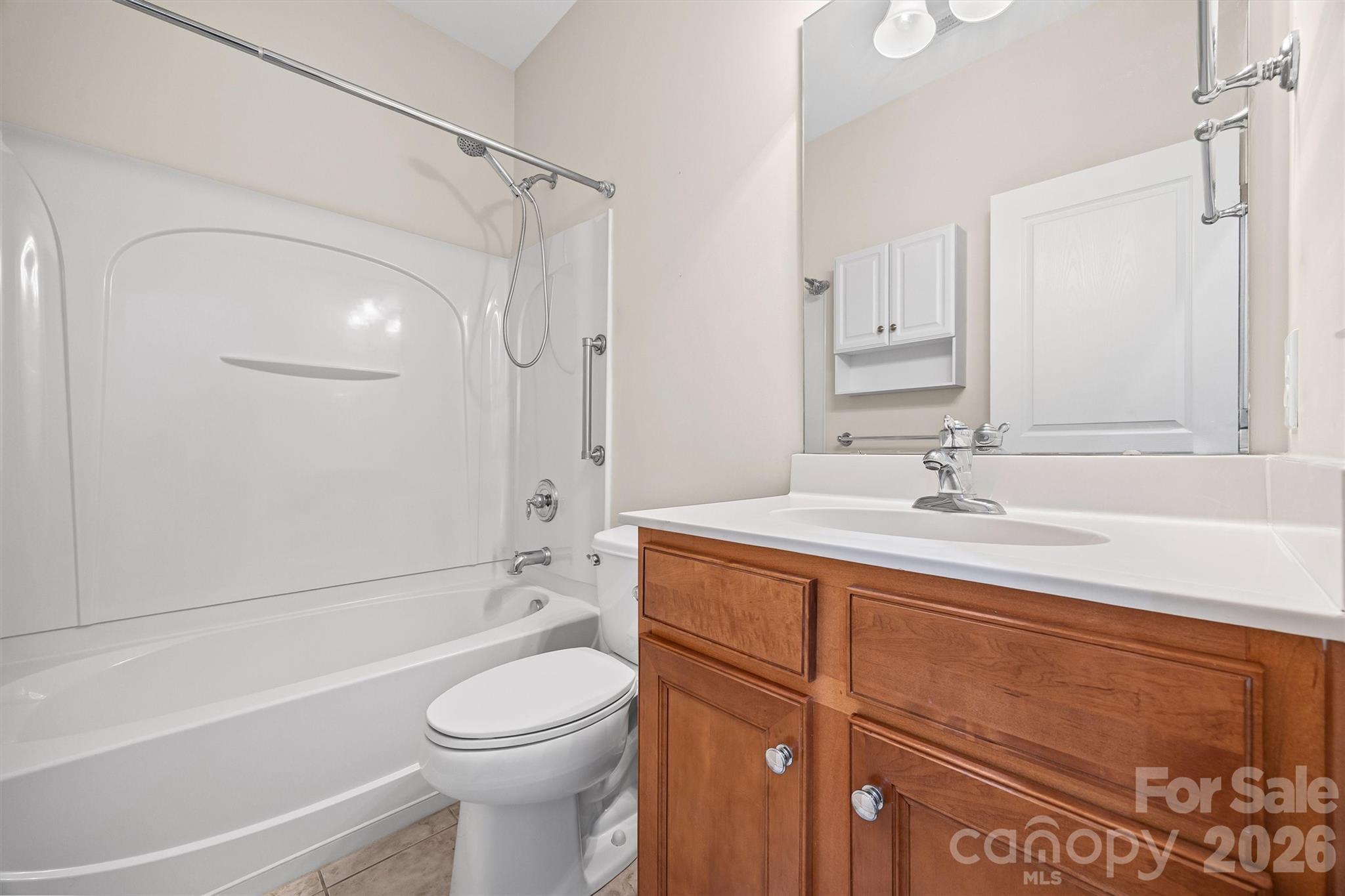 2227 Lilac Lane Fort Mill, SC 29707 - Photo 22 of 42 a bathroom with a sink a toilet and shower