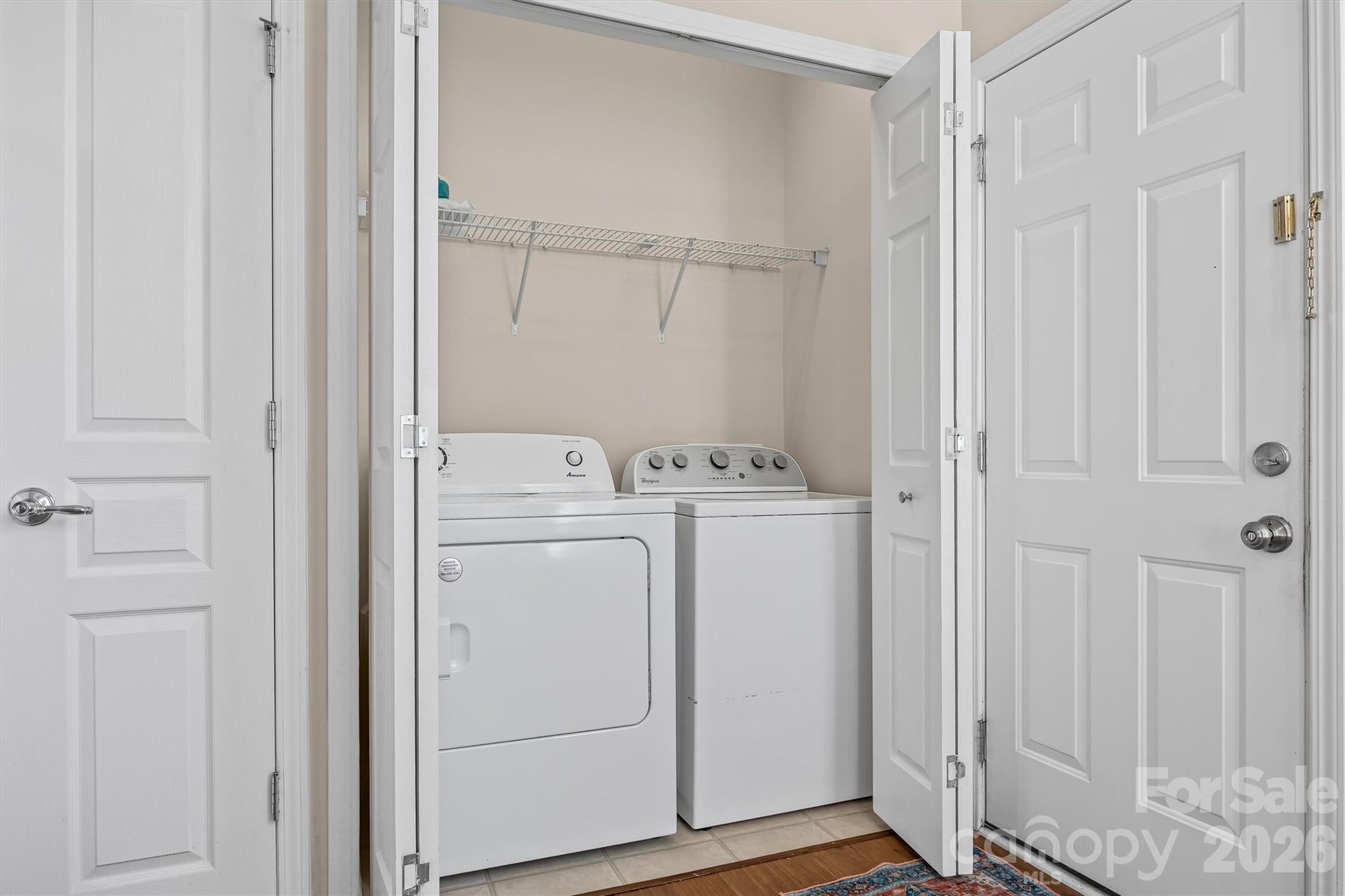 2227 Lilac Lane Fort Mill, SC 29707 - Photo 23 of 42 a utility room with dryer and washer