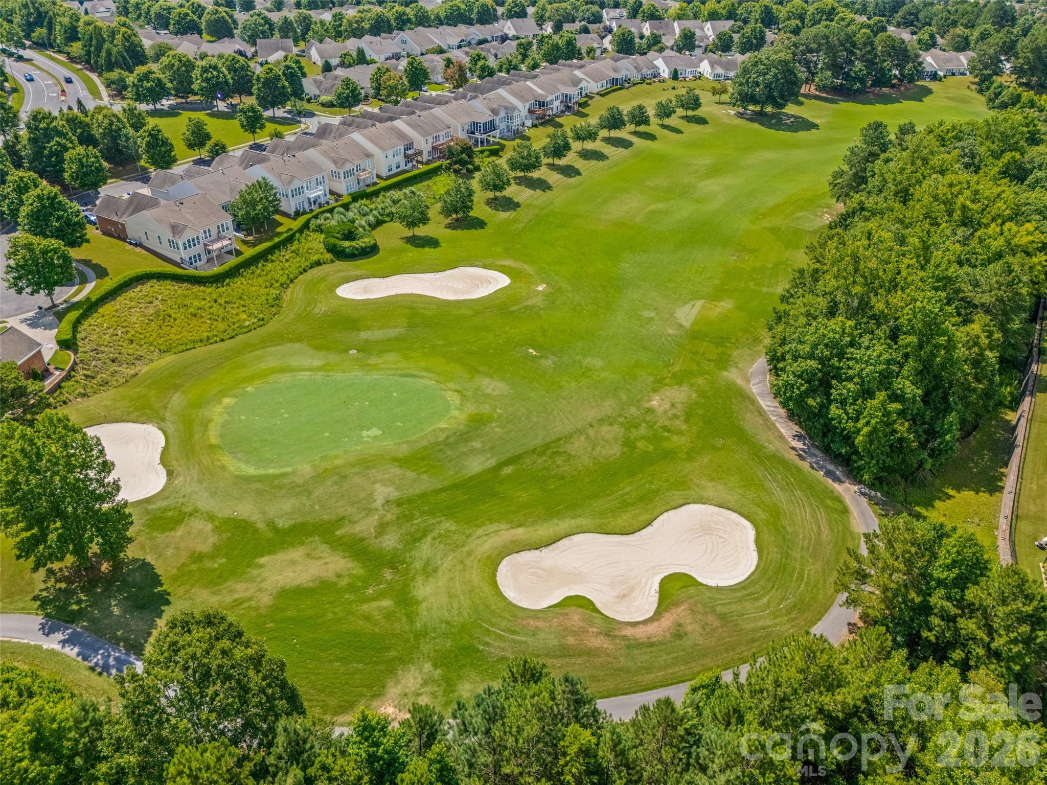 2227 Lilac Lane Fort Mill, SC 29707 - Photo 34 of 42 a view of a golf course with a swimming pool