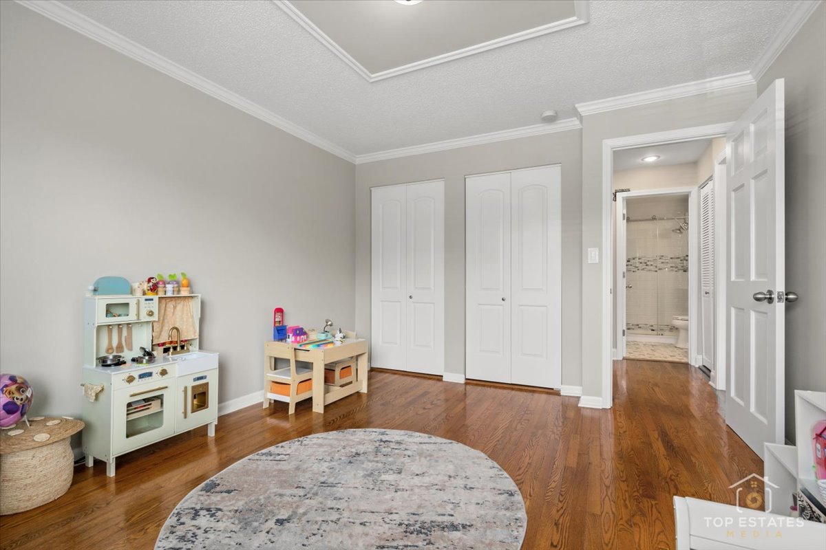 1227 South Old Wilke Road, Unit 201 Rolling Meadows, IL 60005 - Photo 24 of 40 a living room with furniture and wooden floor
