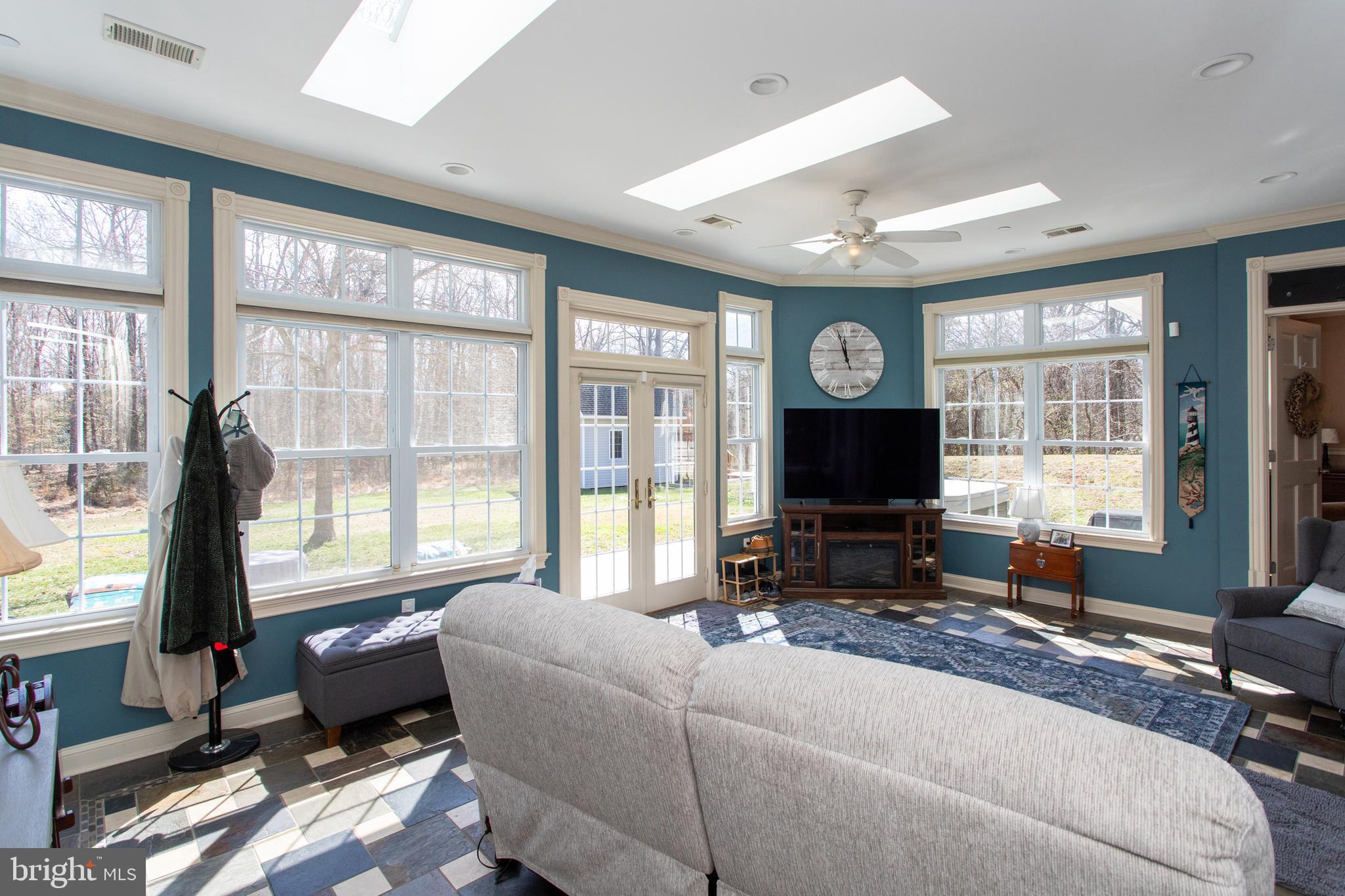 6901 Accokeek Road Brandywine, MD 20613 - Photo 31 of 82 a living room with furniture large window and flat screen tv