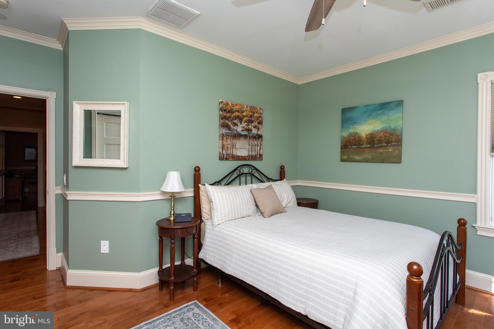 6901 Accokeek Road Brandywine, MD 20613 - Photo 54 of 82 a bedroom with a bed and a painting on the wall