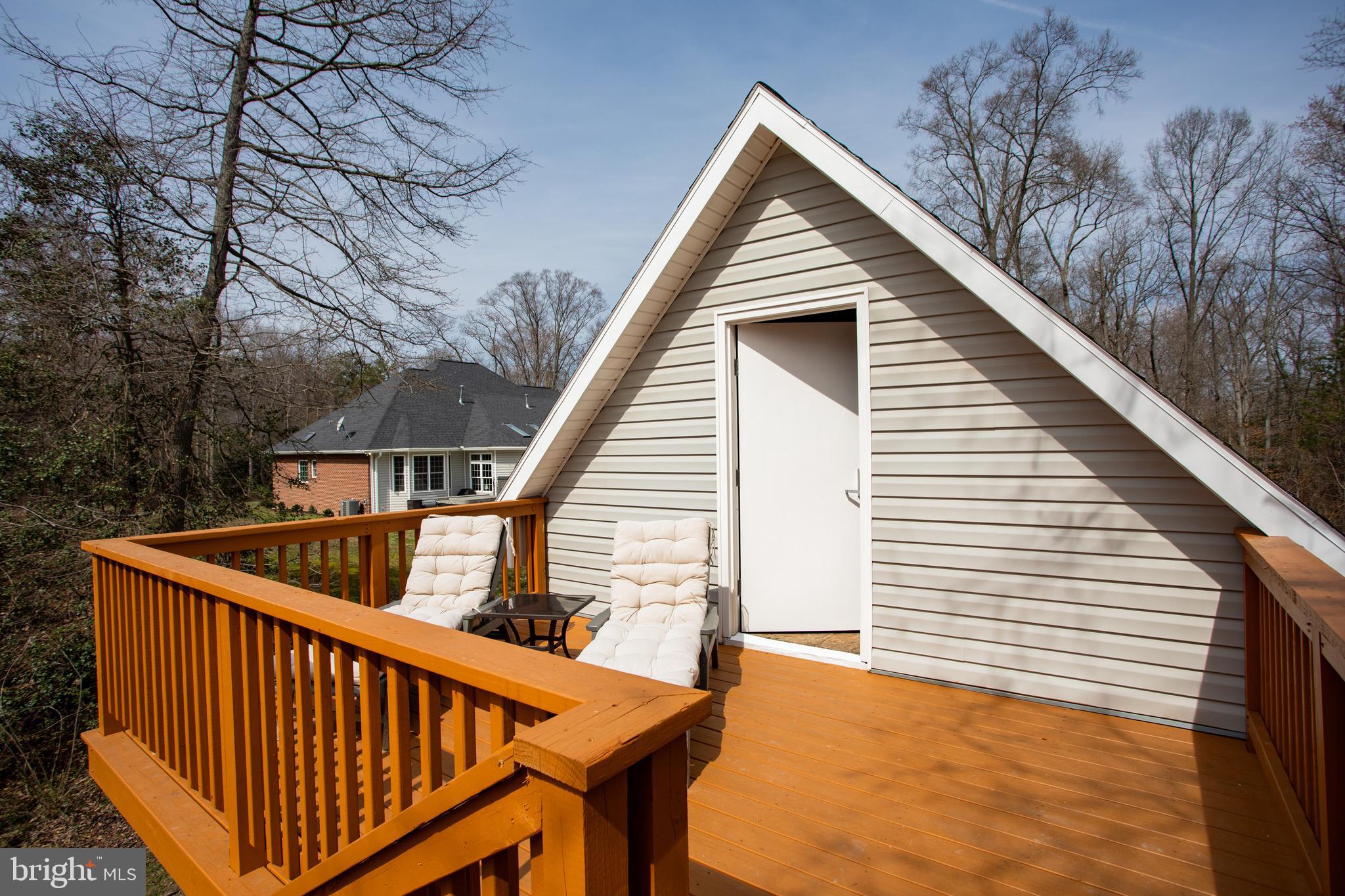 6901 Accokeek Road Brandywine, MD 20613 - Photo 69 of 82 Deck to upper level workshop