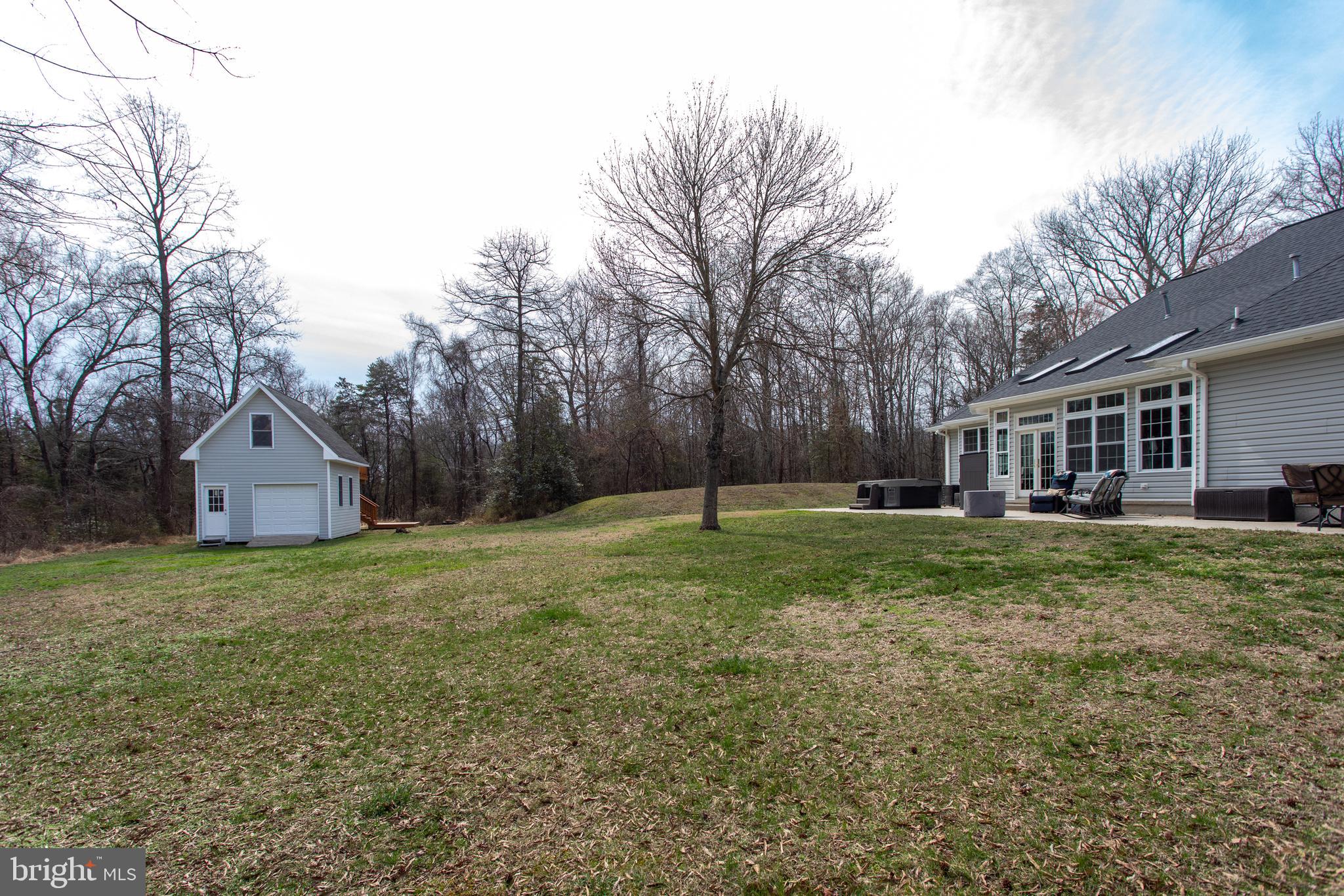 6901 Accokeek Road Brandywine, MD 20613 - Photo 76 of 82 a view of a yard in front of a house with large trees