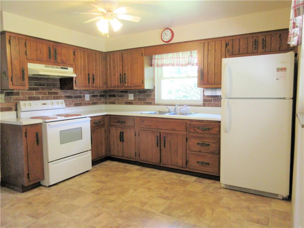 714 Freeport Road Freeport, PA 16229 - Photo 4 of 25 This eat-in kitchen has newer vinyl flooring, a pantry, ceiling fan with lights, and the appliances are included with the sale of this home.