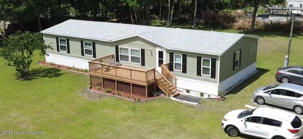 18137 Hollister Road Orlando, FL 32820 - Photo 19 of 27 a house with a outdoor space