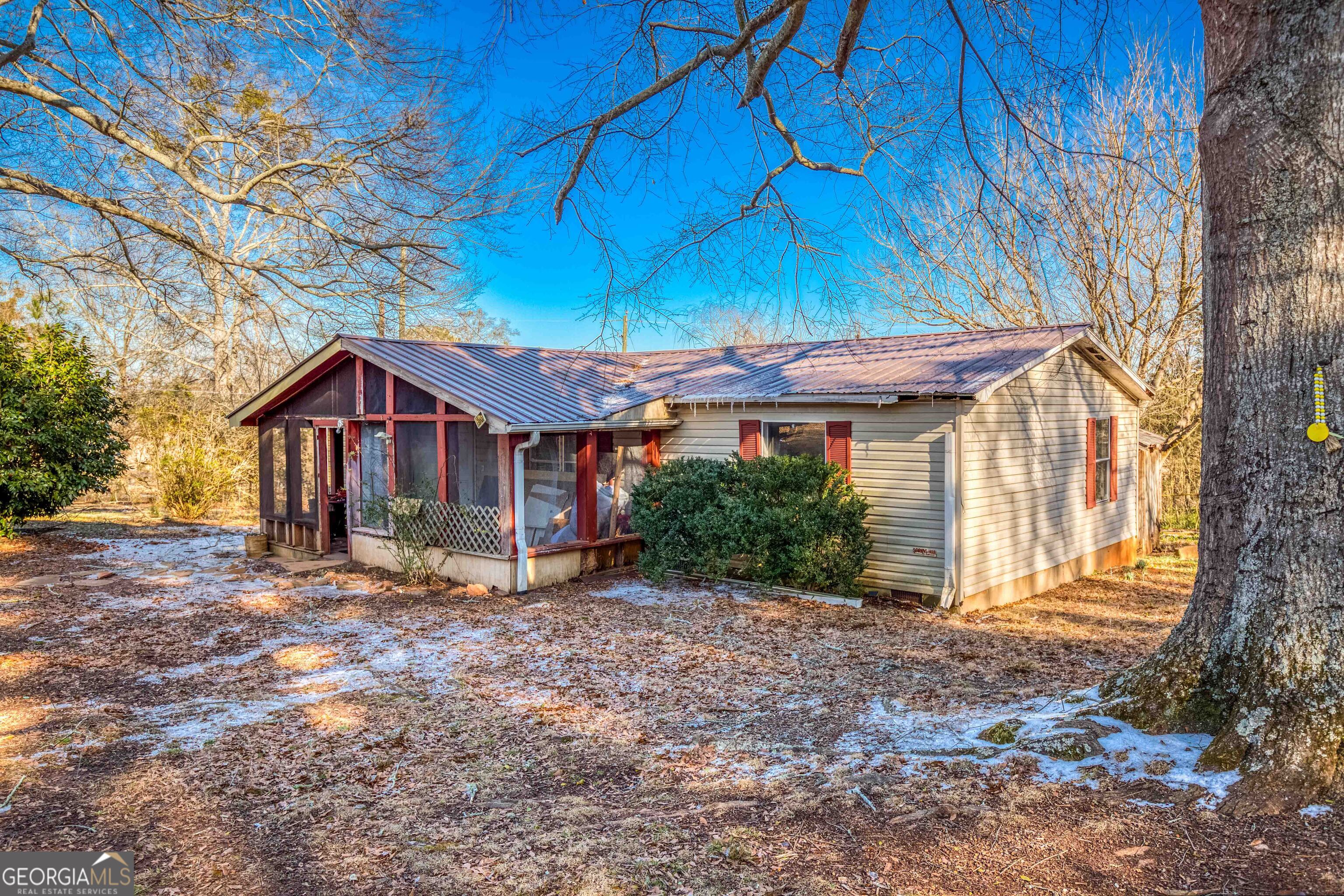 3207 Jack Glass Road Monroe, GA 30656 - Photo 2 of 10 a view of a house with a yard