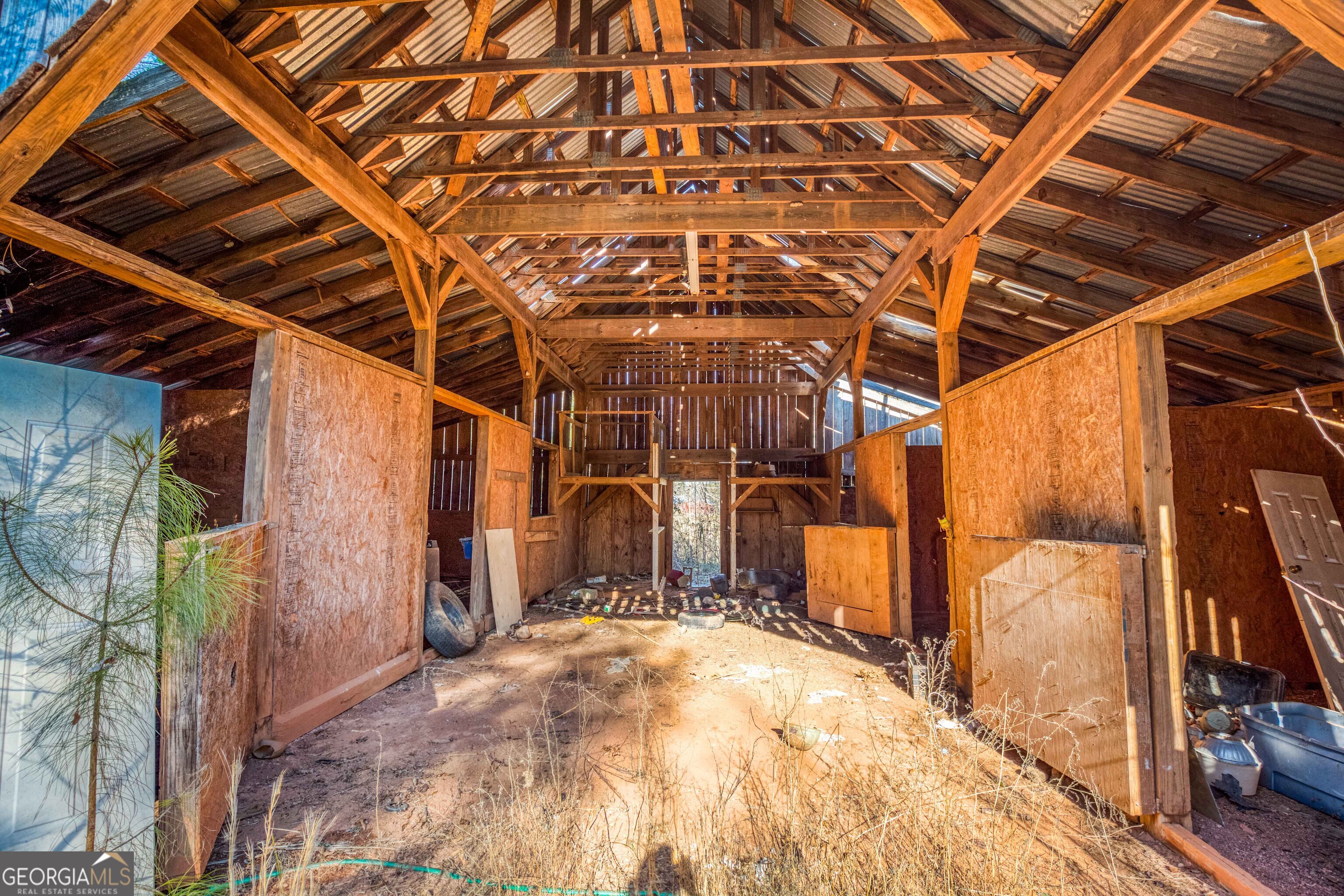 3207 Jack Glass Road Monroe, GA 30656 - Photo 6 of 10 a view of a room with wooden floor