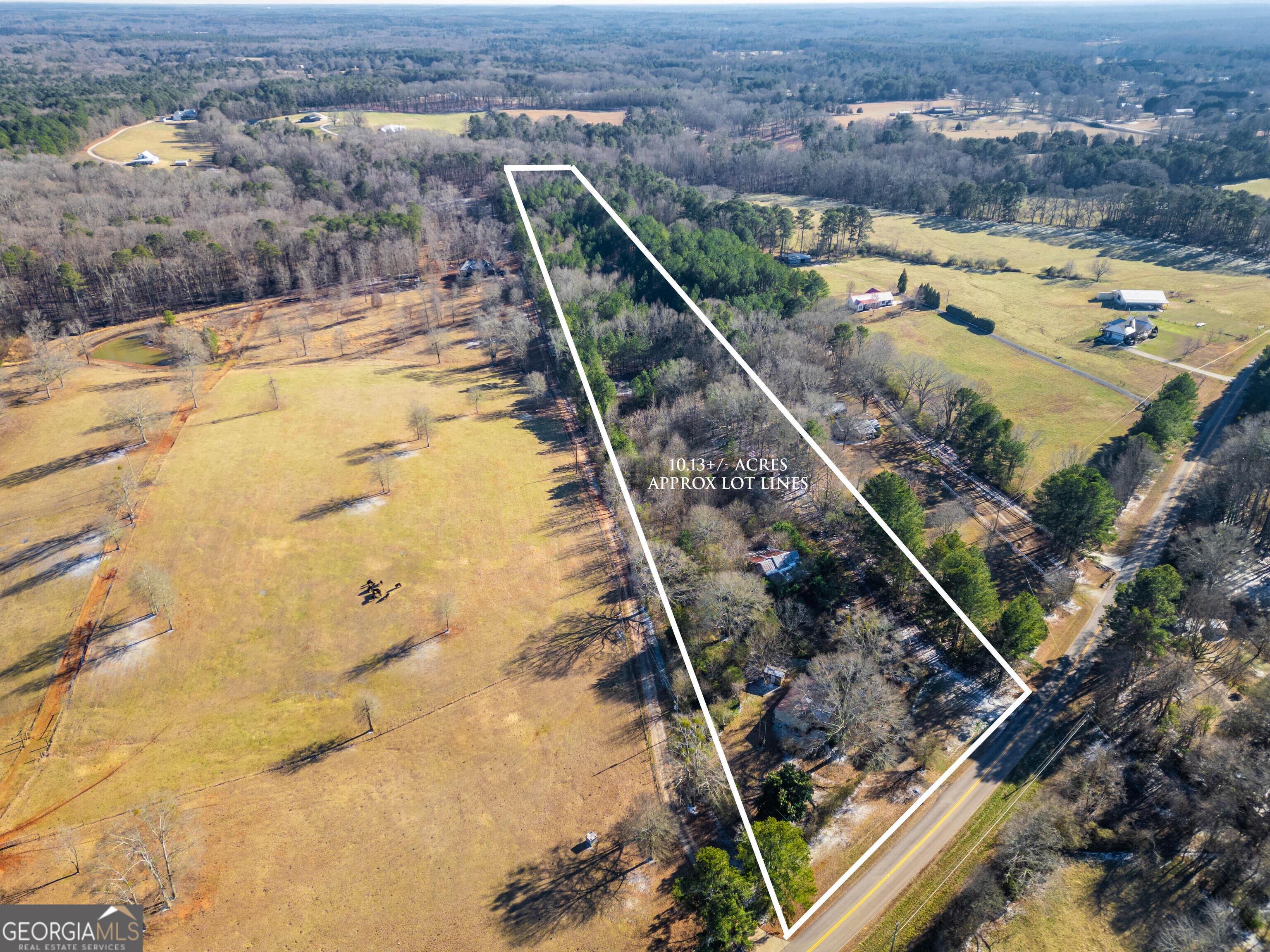 3207 Jack Glass Road Monroe, GA 30656 - Photo 8 of 10 a view of a swimming pool with a terrace
