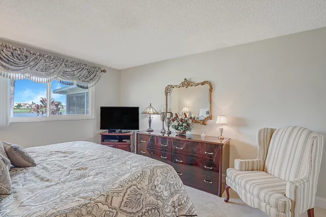 a bedroom with a bed and furniture