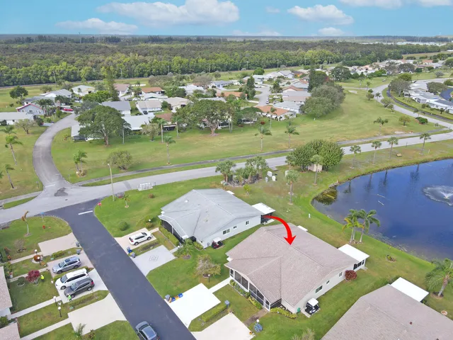 an aerial view of a house with a garden