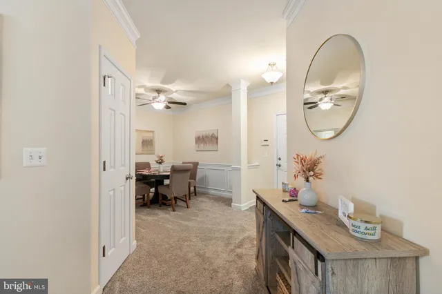 a very nice looking dining room with a table and chairs