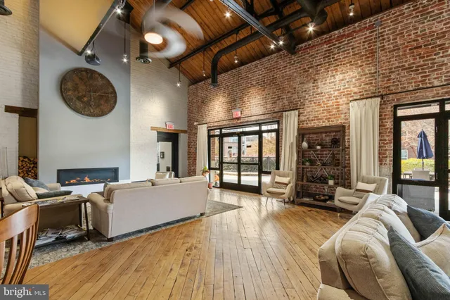 a living room with couch and a table