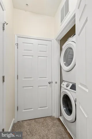 a view of a storage & utility room with washer and dryer