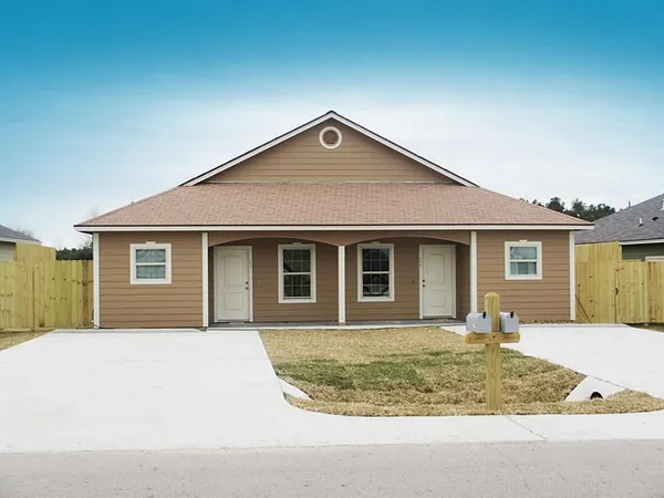 a front view of house with yard