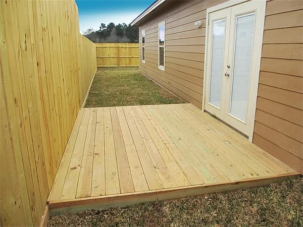a view of backyard with garage