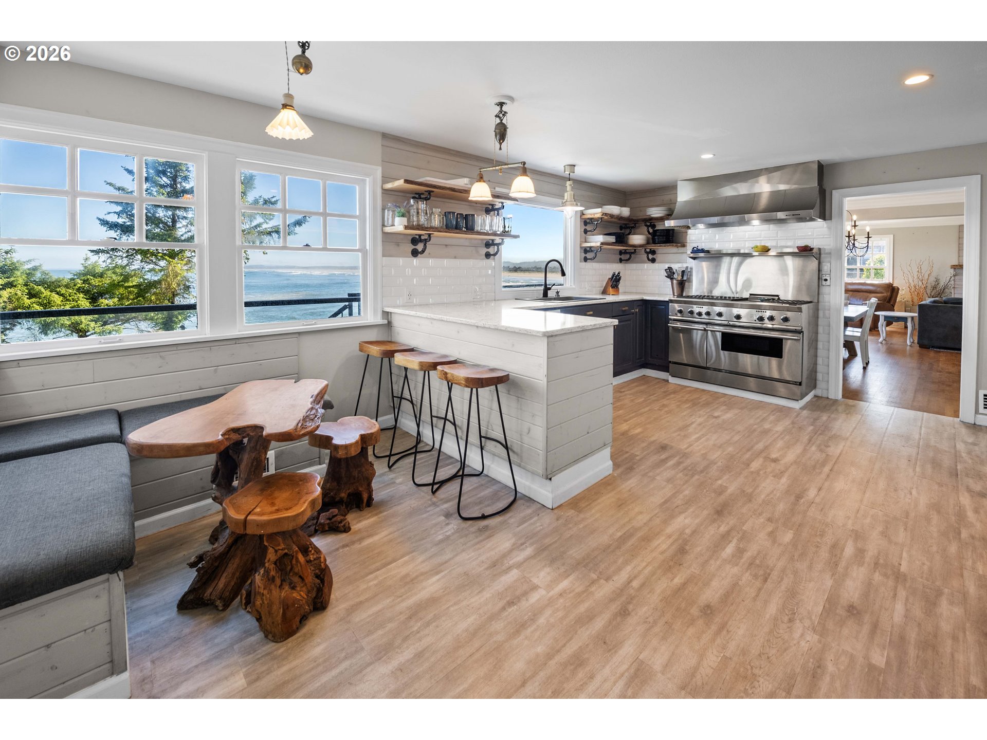 3232 Sunset Boulevard Seaside, OR 97138 - Photo 12 of 48 a living room with stainless steel appliances furniture and a kitchen view