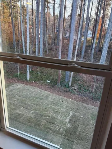 a bathroom with a double vanity sink and mirror