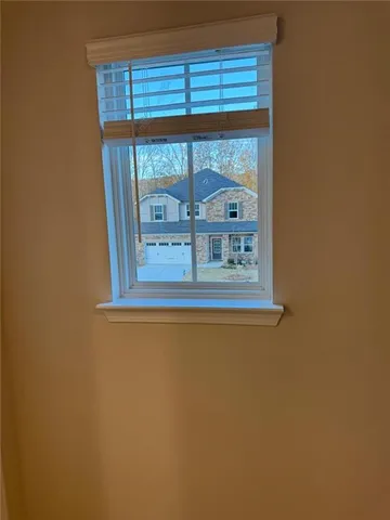 a bathroom with a double vanity sink and mirror