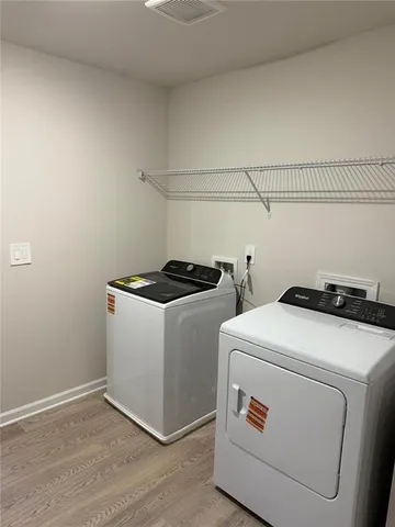 a view of outdoor space with deck and yard