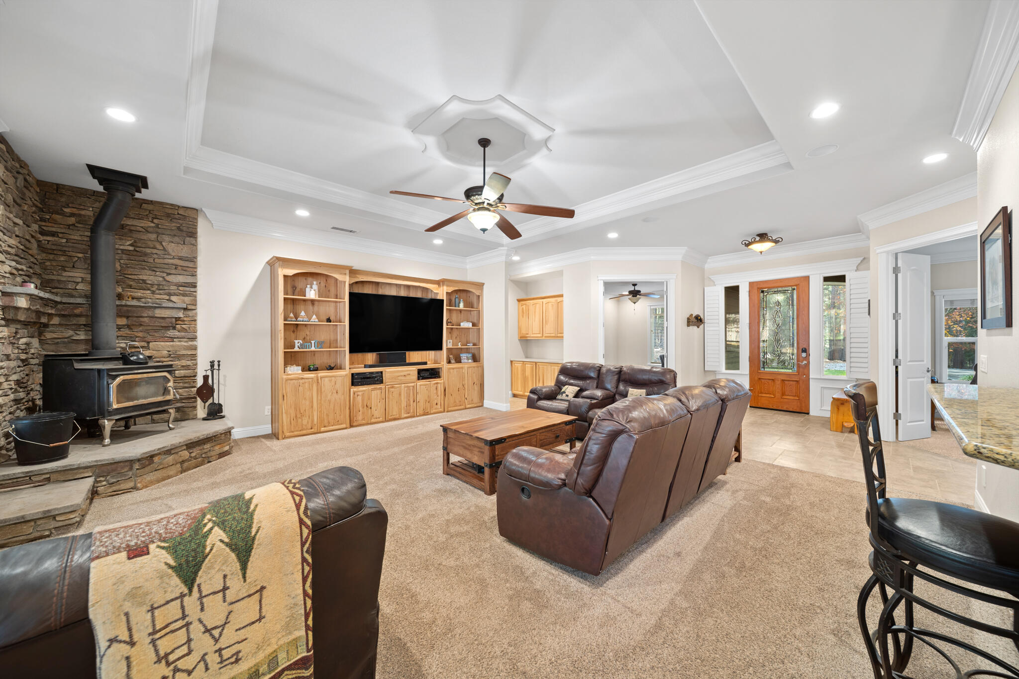 7795 Eastmoore Road Shingletown, CA 96088 - Photo 11 of 61 a living room with furniture and a flat screen tv