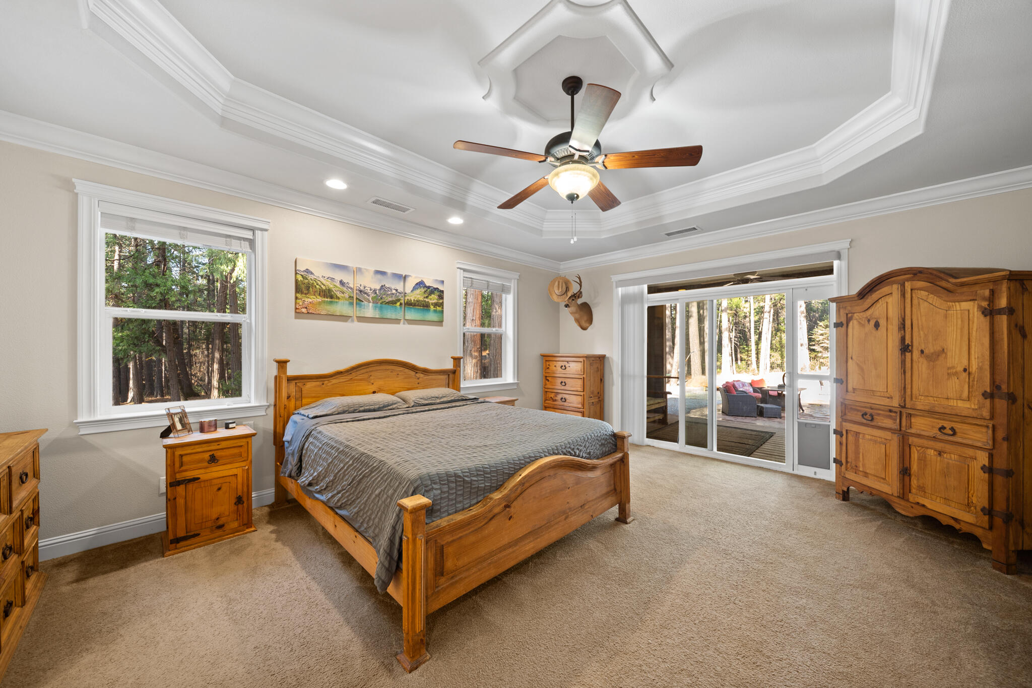 7795 Eastmoore Road Shingletown, CA 96088 - Photo 19 of 61 a bed sitting in a room next to a window and a larger closet