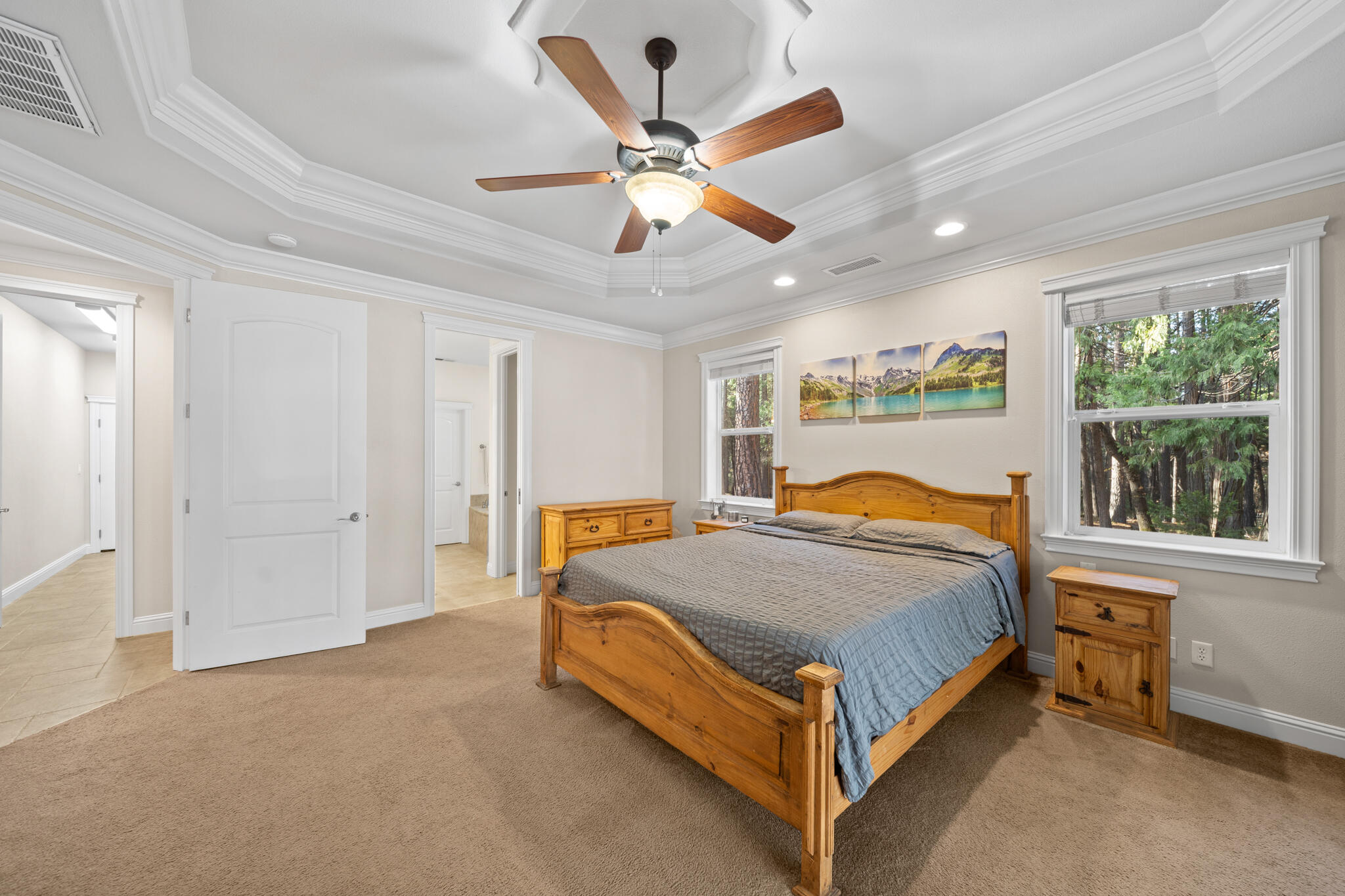 7795 Eastmoore Road Shingletown, CA 96088 - Photo 20 of 61 a bed sitting in a spacious bedroom next to a window