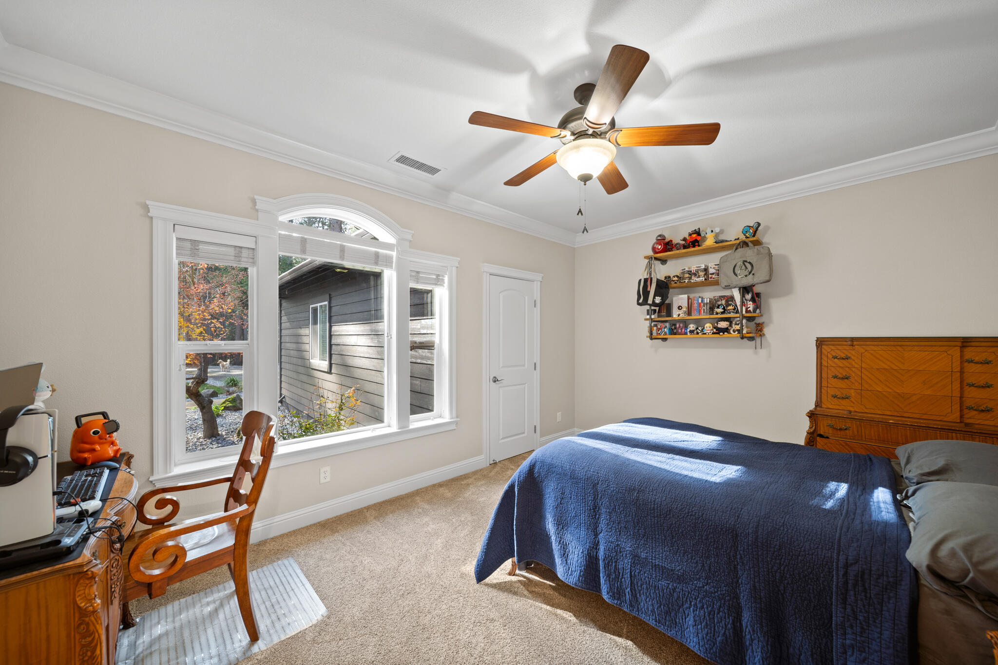 7795 Eastmoore Road Shingletown, CA 96088 - Photo 27 of 61 a bedroom with a bed and a window