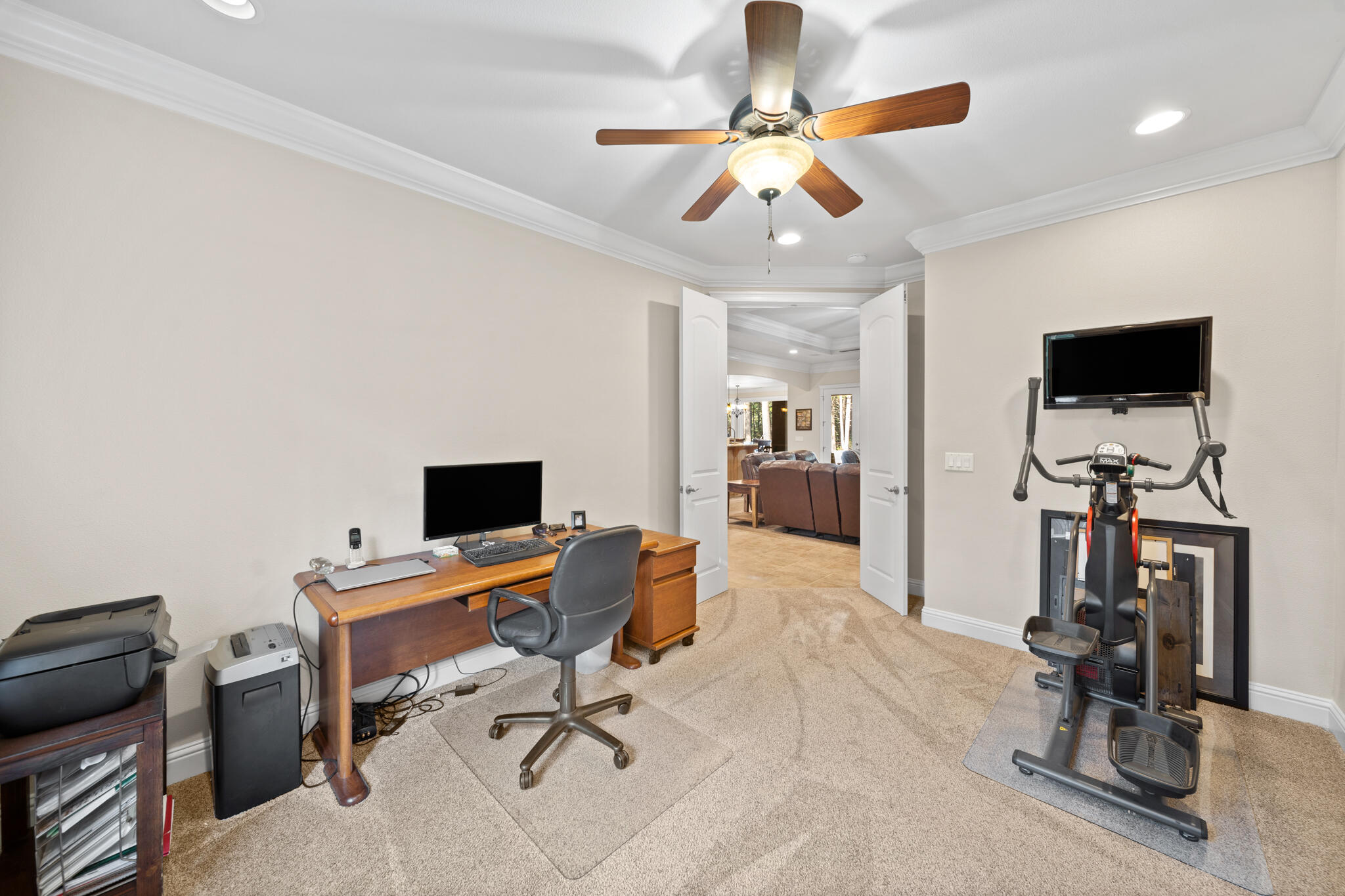 7795 Eastmoore Road Shingletown, CA 96088 - Photo 30 of 61 a view of a workspace with furniture and a ceiling fan