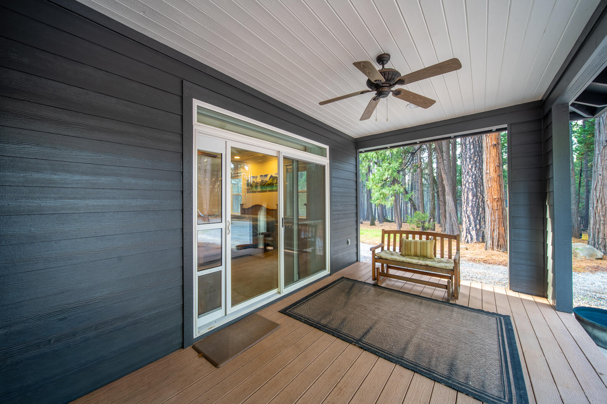 7795 Eastmoore Road Shingletown, CA 96088 - Photo 37 of 61 a view of outdoor space with porch and wooden floor
