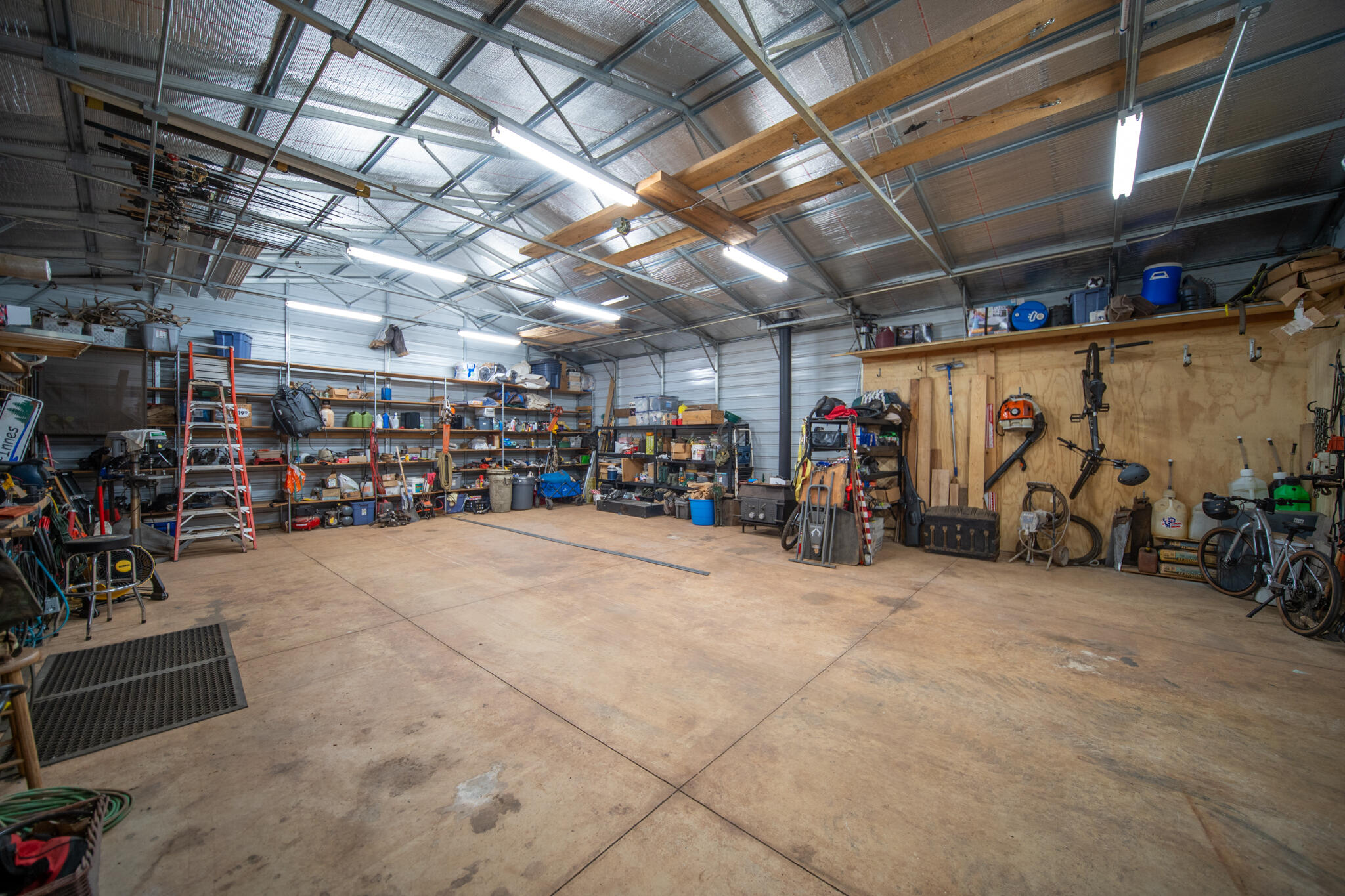 7795 Eastmoore Road Shingletown, CA 96088 - Photo 49 of 61 a view of a storage room with racks