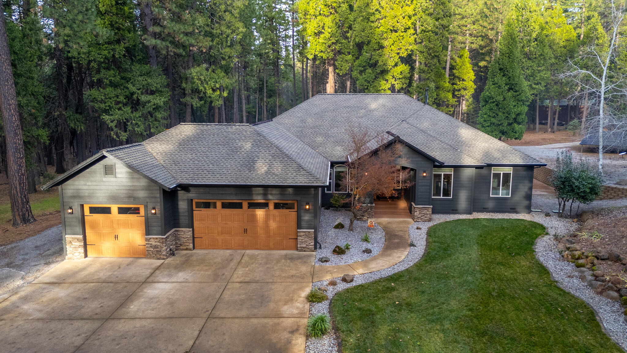 7795 Eastmoore Road Shingletown, CA 96088 - Photo 53 of 61 a aerial view of a house with swimming pool and porch