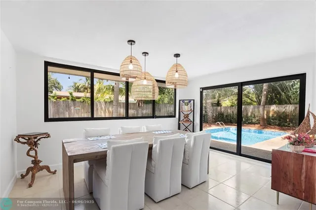 a view of a livingroom with workspace and window