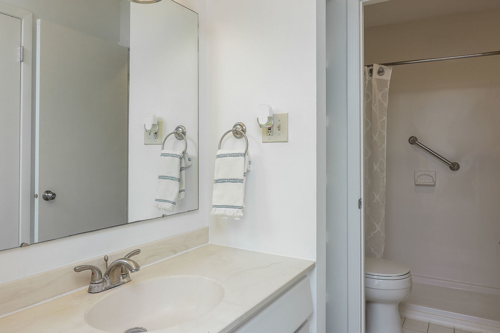 1657 Dover Court, Unit D Wheaton, IL 60189 - Photo 12 of 15 a bathroom with a granite countertop sink toilet and shower