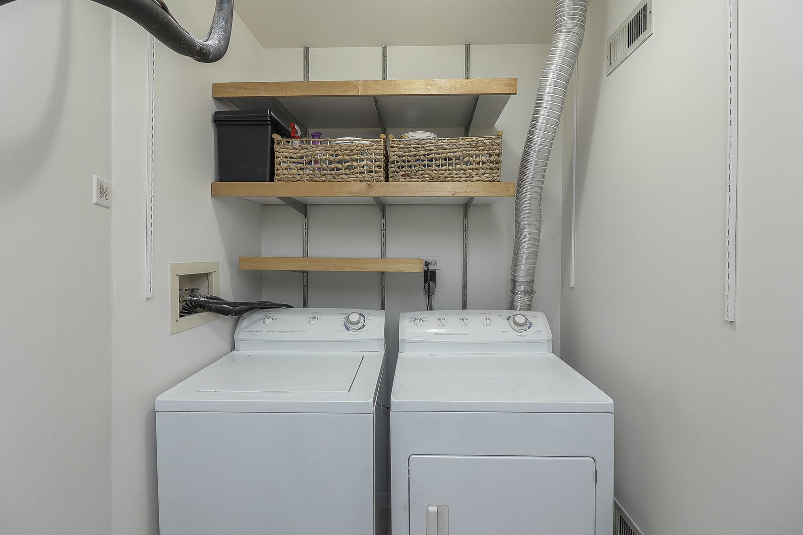 1657 Dover Court, Unit D Wheaton, IL 60189 - Photo 13 of 15 a utility room with dryer and washer