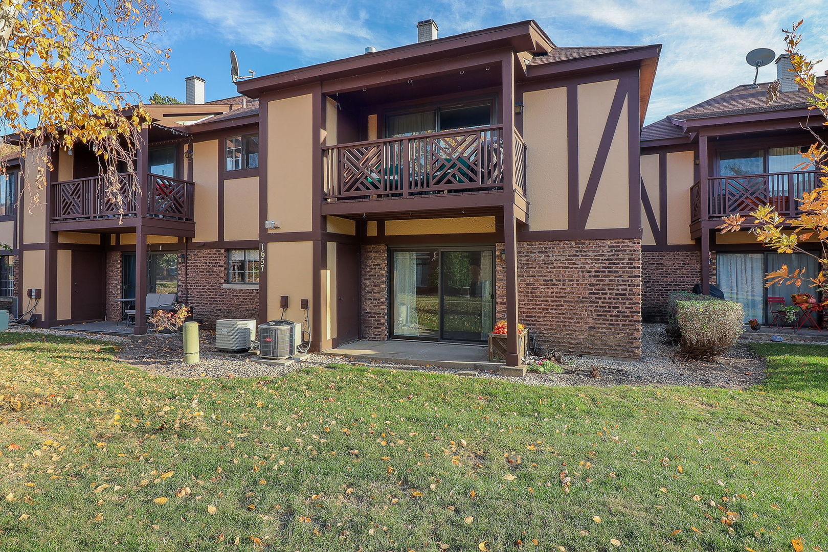 1657 Dover Court, Unit D Wheaton, IL 60189 - Photo 15 of 15 a front view of a house with garden