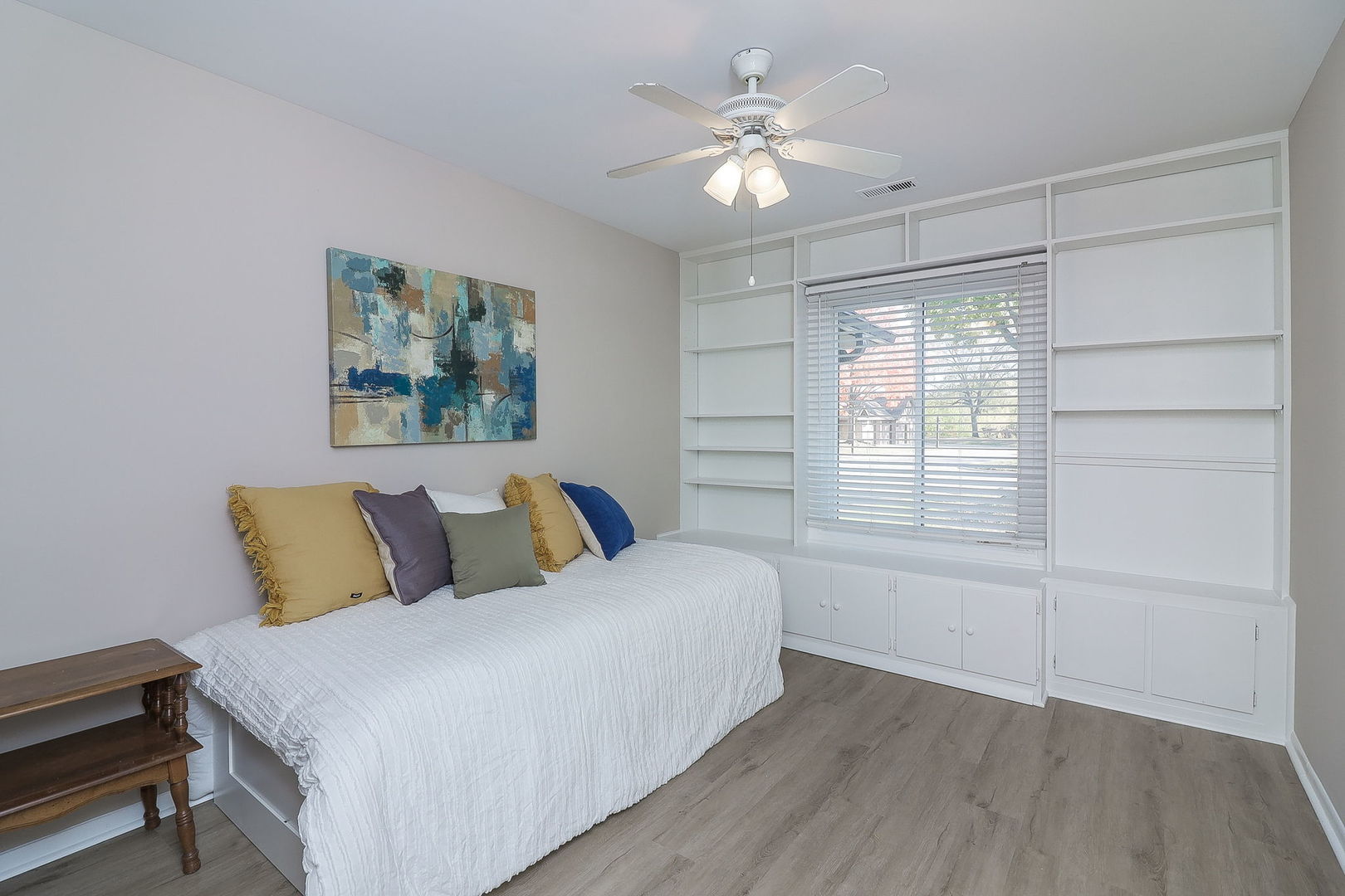 1657 Dover Court, Unit D Wheaton, IL 60189 - Photo 9 of 15 a spacious bedroom with a bed and a window