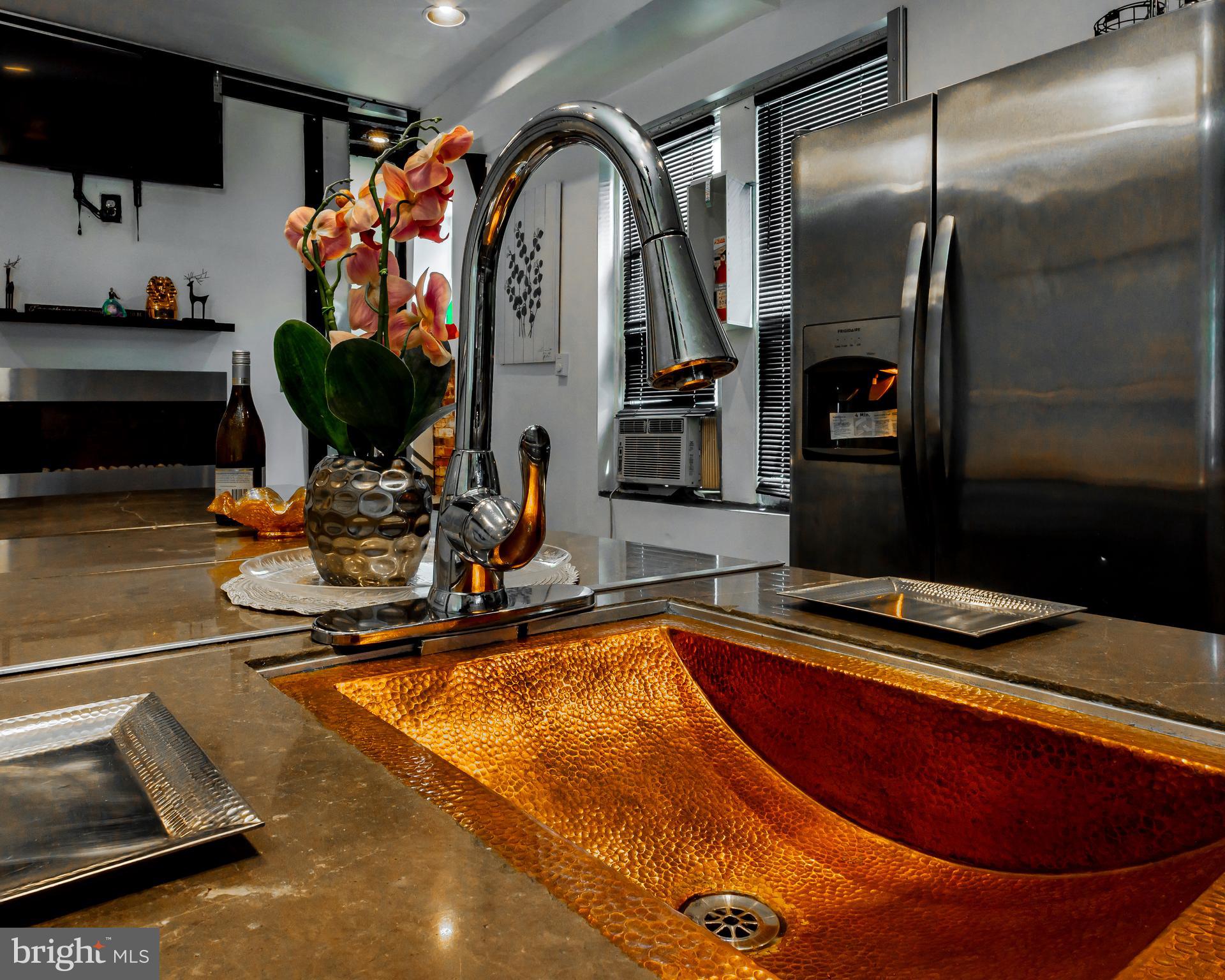 424 State Street Camden, NJ 08102 - Photo 17 of 36 a room with gym equipment