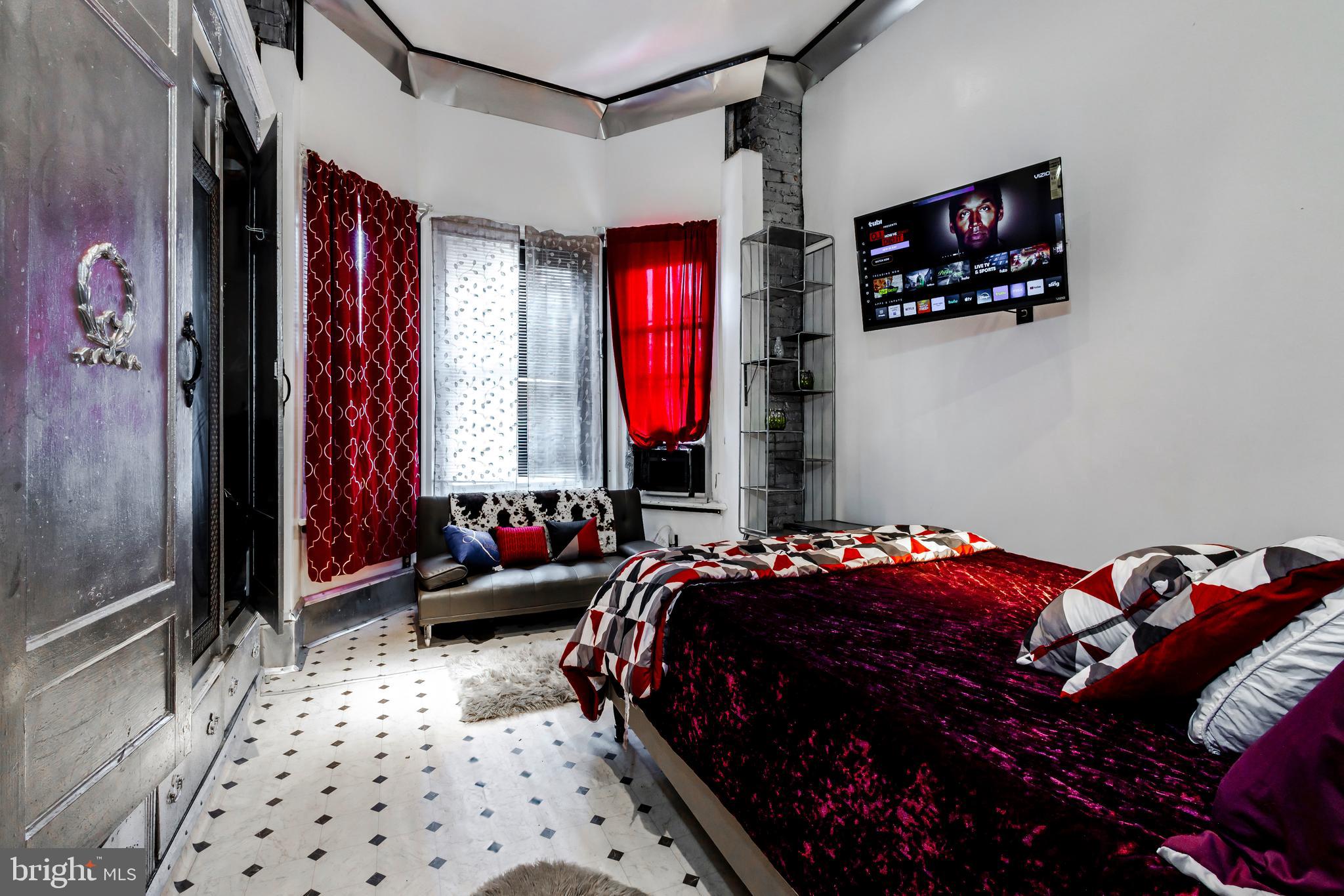 424 State Street Camden, NJ 08102 - Photo 21 of 36 a bedroom with bed and a window