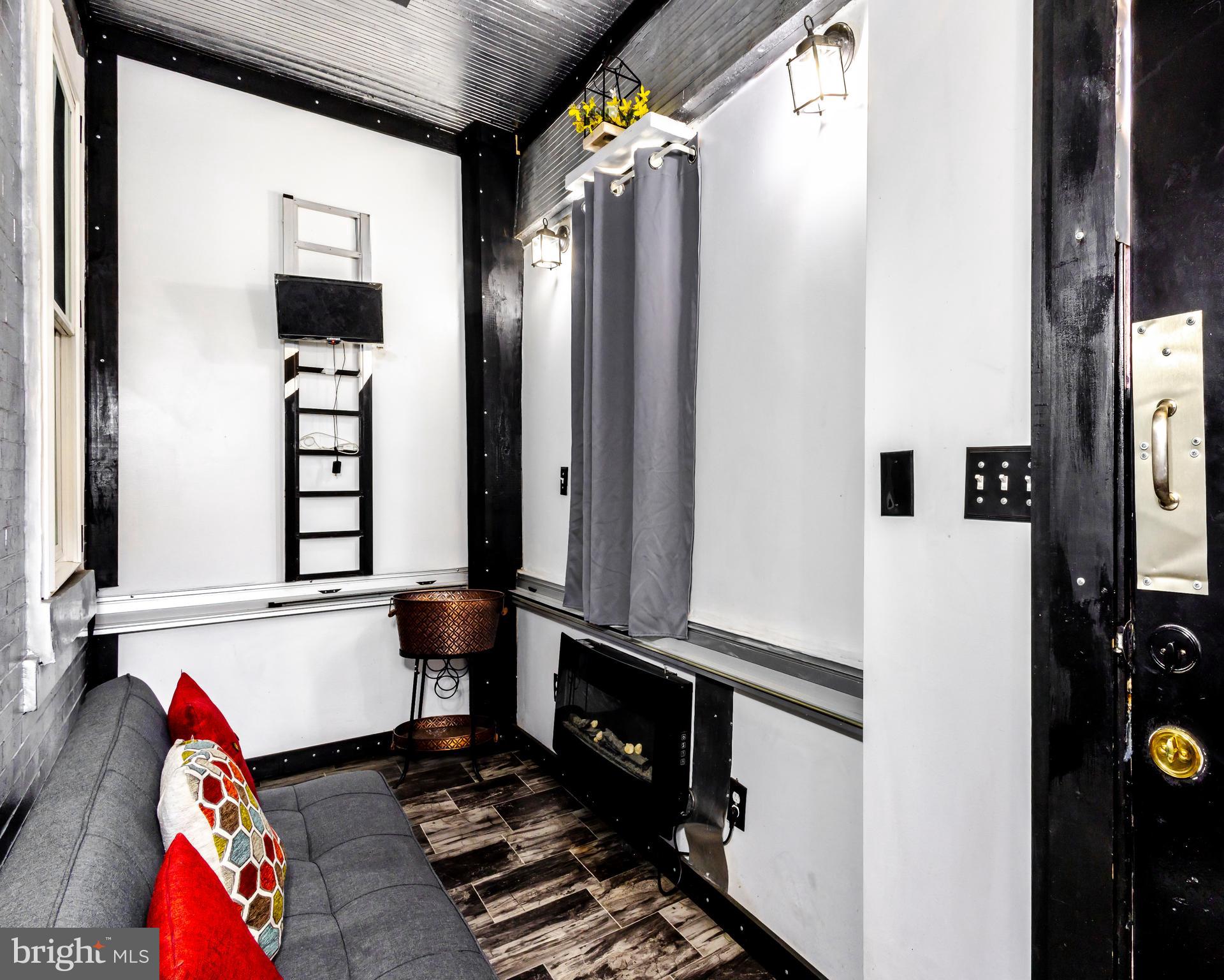 424 State Street Camden, NJ 08102 - Photo 3 of 36 storage and utility room with two washing machine