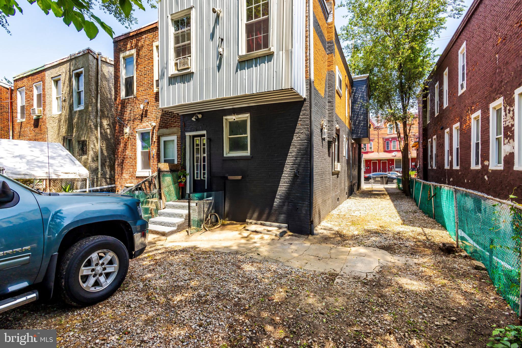 424 State Street Camden, NJ 08102 - Photo 34 of 36 a front view of a house with a yard