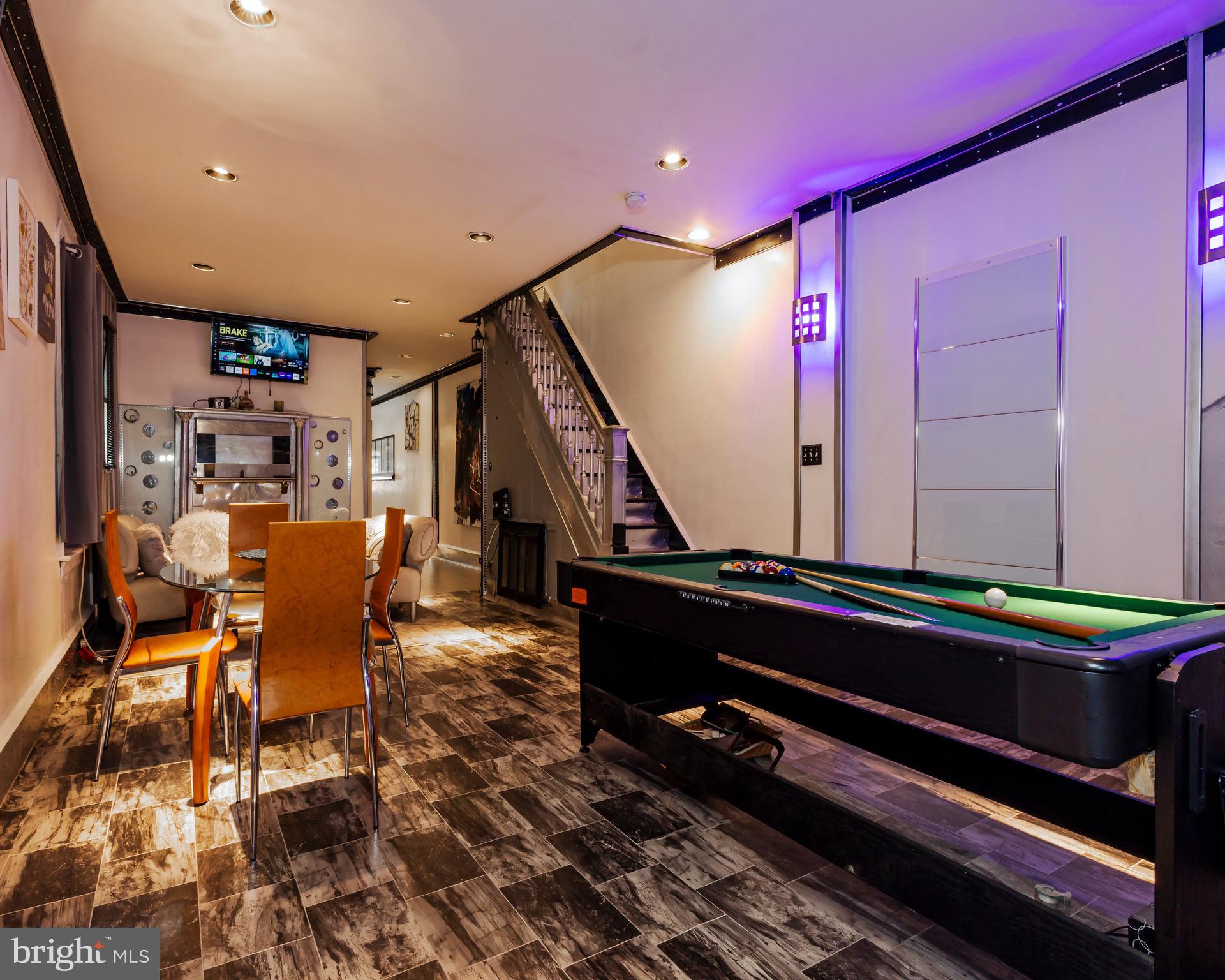 424 State Street Camden, NJ 08102 - Photo 5 of 36 a room with furniture pool table and stairs