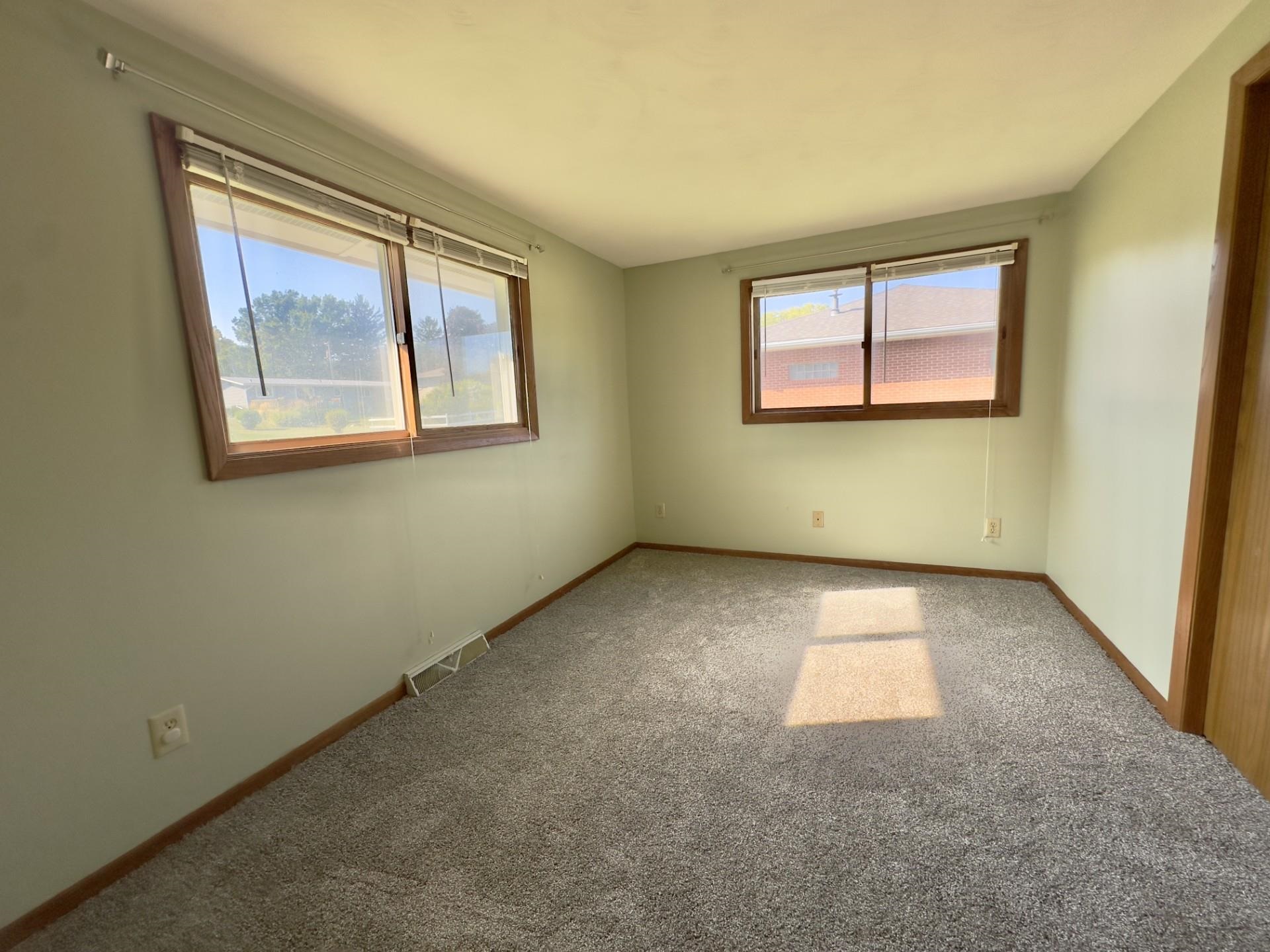 550 Hanabarger Street Lanark, IL 61046 - Photo 13 of 21 an empty room with windows