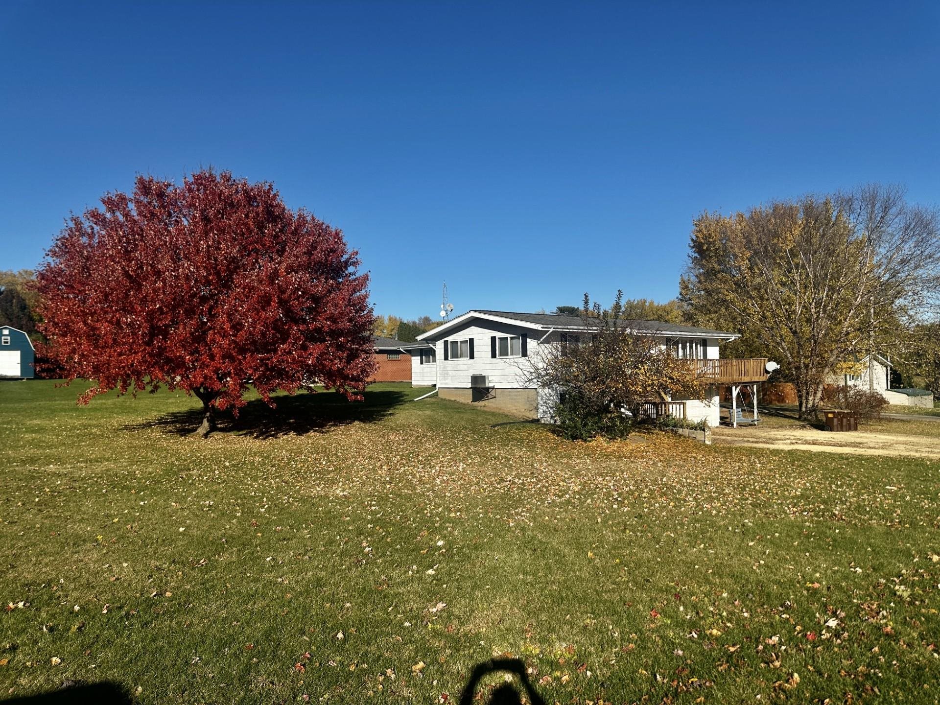 550 Hanabarger Street Lanark, IL 61046 - Photo 18 of 21 a front view of a house with a yard