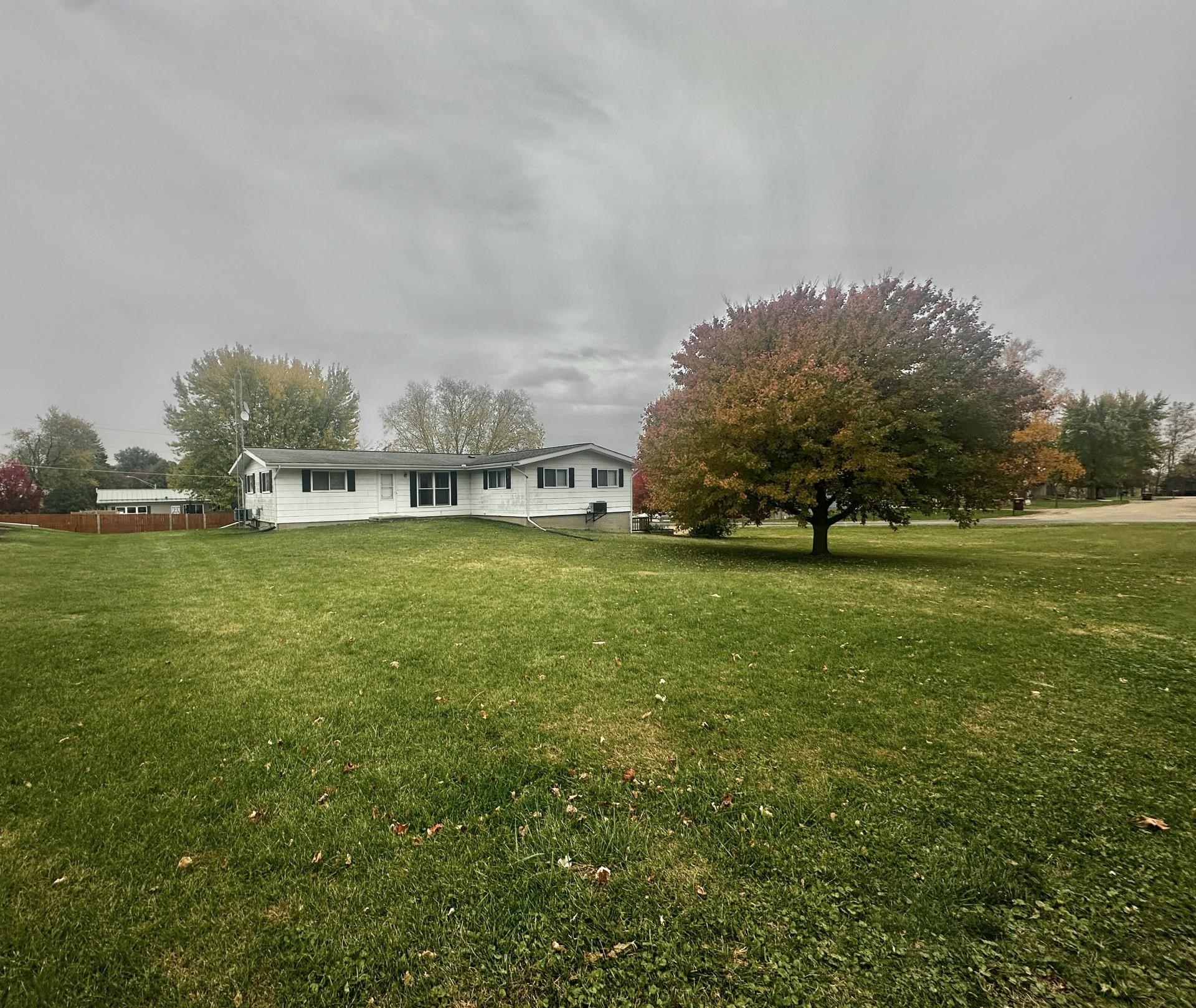 550 Hanabarger Street Lanark, IL 61046 - Photo 21 of 21 a view of a field of grass and trees